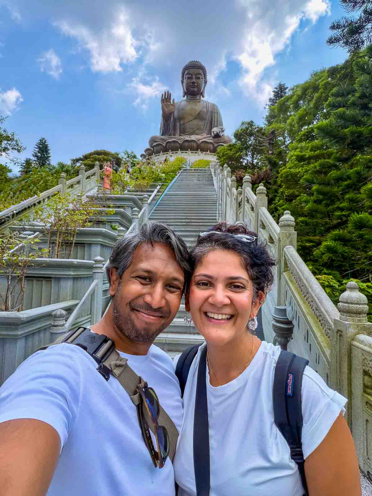 Riz and Reem at the foot of the staircase leading to the Tian Tan Buddha on Lantau Island.